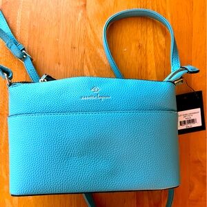 Blue Nanette Lepore crossbody bag. Never used still has tag.